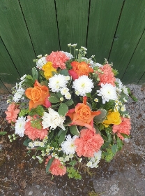 Orange and white grave posy